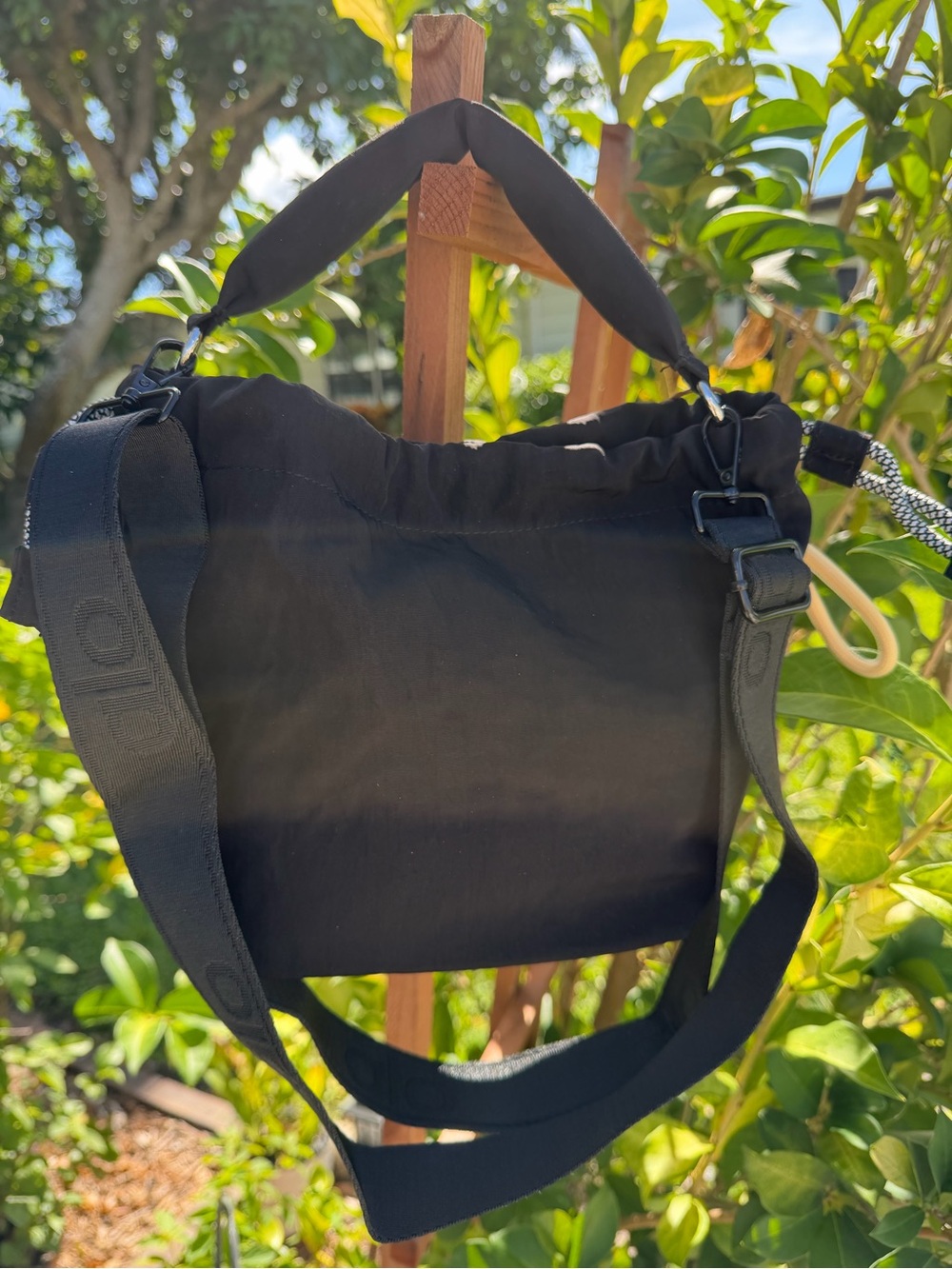 ALO Yoga Black Drawstring Mini Bucket Bag with Candy Charm - Picture 7 of 16